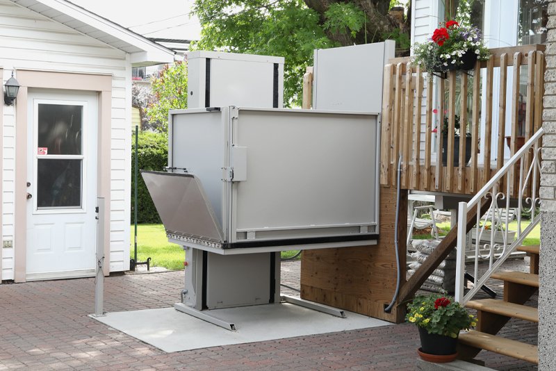 Vertical platform lift for wheelchair and power chair access